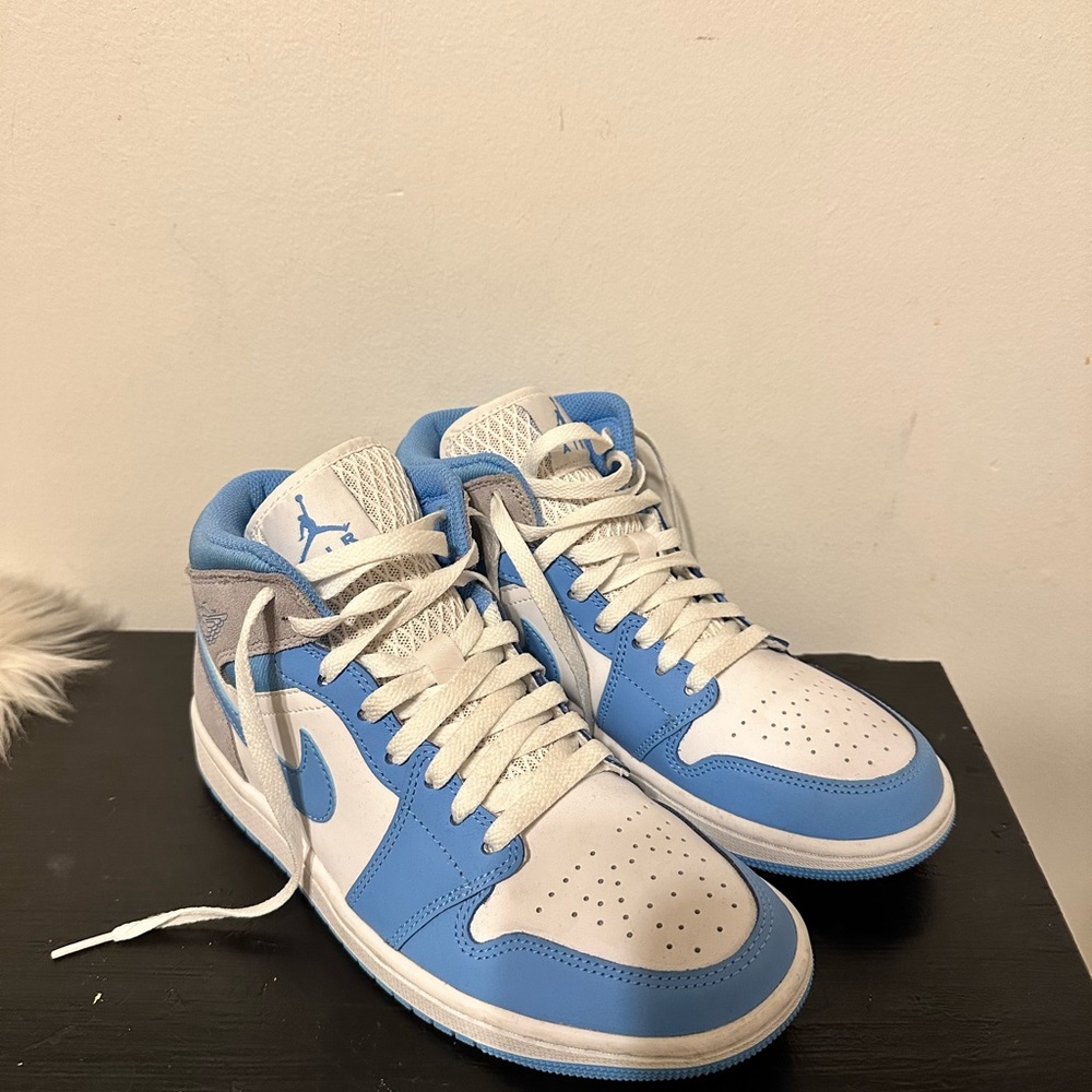 Air Jordan 1 Mid White and Blue Sneakers